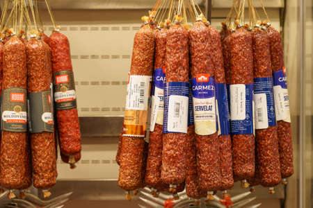 December 2, 2021 Balti Moldova. Illustrative editorial. Supermarket showcase with sausage. Background with copy space for text or inscriptions.のeditorial素材