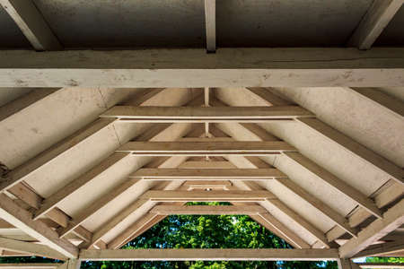 Wooden floors and beams of the old roof. Background with copy space for text or inscriptions.の写真素材