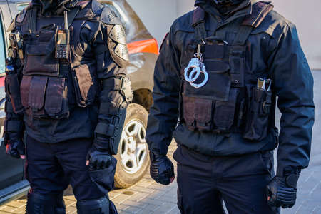 Bulletproof vest of the special police unit for the assault. Background for crime news with selective focus and copy space.の写真素材