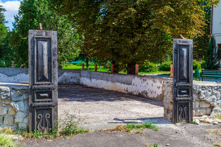 Old doors as a conceptual symbol. Background with copy space for text or inscriptions.