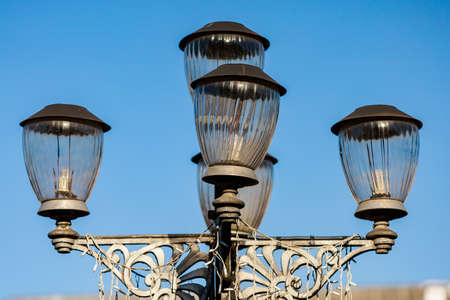 Street lights lighting in an urban environment. Background with copy space for text