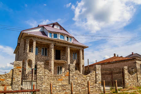 Country houses under construction in a cottage village. Background with copy spaceの写真素材