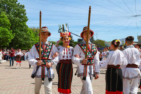 People in authentic national costumes. Parade and celebration of the City Day on May 22, 2021 Balti...