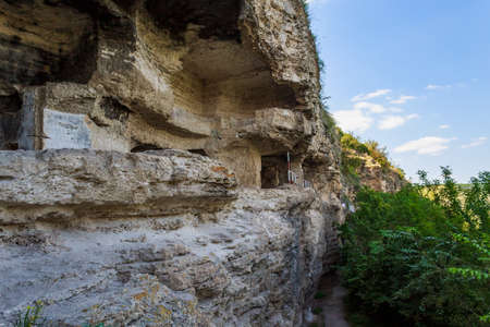 Rocky monastery with cells for monks. Background with copy space for textの写真素材
