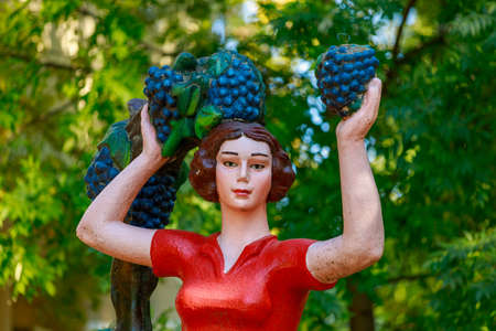 Grapes as an element of culture in the architecture of southern peoples and countries with developed winemaking. Background with copy space for text or inscriptions.の写真素材
