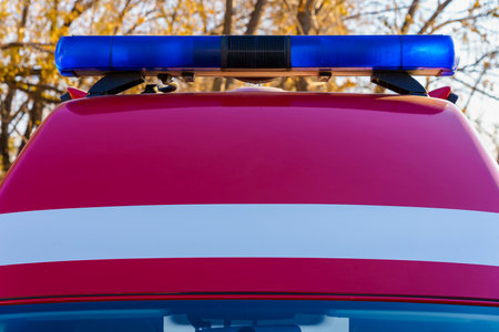 Car with flashing lights emergency rescue service. Background with copy space for textの写真素材