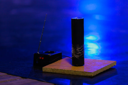 Fireworks with remote control and arsonist in the dark on the stage. Background with copy space for...