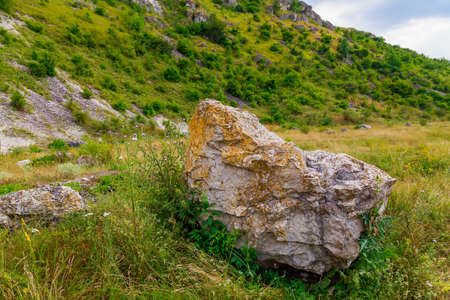 Wild hilly and rocky nature. Eastern european background with copy space for text or letteringの写真素材