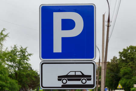 Road sign parking for cars. Background with copy space for textの写真素材