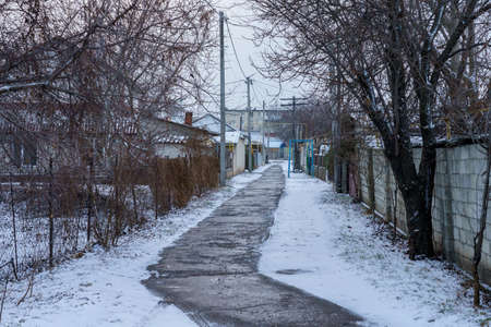 A melted path on a heating main in winter. Background with copy space for textの写真素材