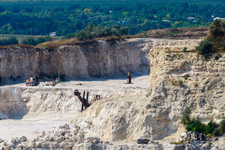The operating huge quarry for the extraction of stone. Natural limestone. Background with copy space...