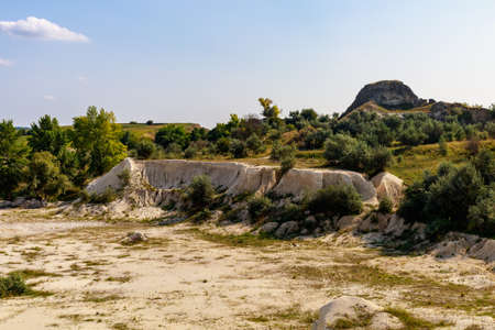 The operating huge quarry for the extraction of stone. Natural limestone. Background with copy space for textの写真素材
