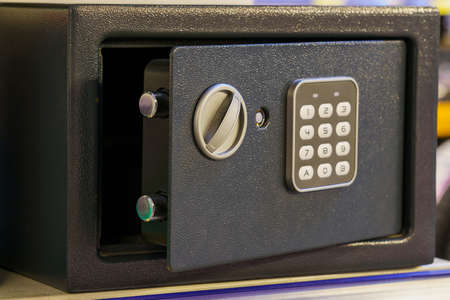 Safe for storing valuables or firearms. Background with copy space for text or lettering.