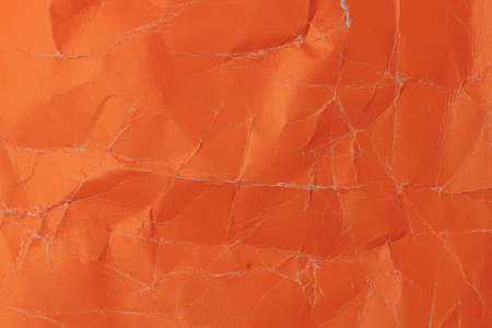 Rough crumpled texture surface of retro old vintage classic grunge paper. Background or backdrop. Design blank. Strong redの写真素材