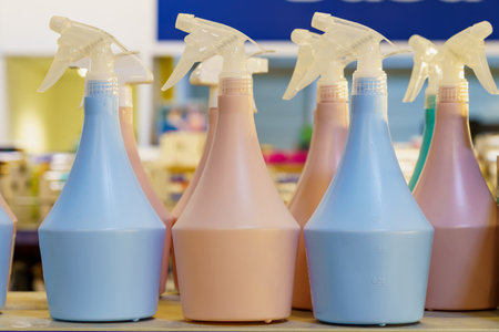 Sprayers on the store shelf. Household department of the supermarket. Caring for flowers and plants.の写真素材