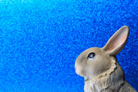 Abstract figurine of a rabbit. Symbol of 2023 according to the Eastern calendar. Background with copy space for textの写真素材