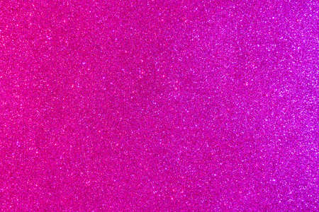 Background with sparkles. Backdrop with glitter. Shiny textured surface. Strong pink. Mixed neon...