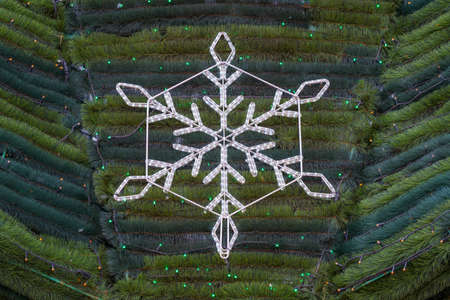 New Years decor on the street urban Christmas tree. Background with selective focus and copy space for textの写真素材