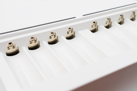 Cells with contacts for charging rechargeable batteries with selective focus and blurred background....