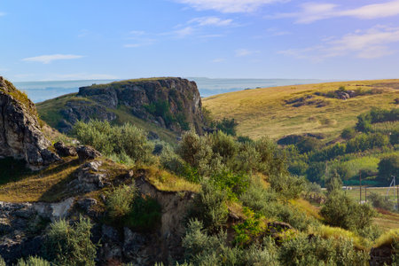 Wild rocky and mountainous nature of Eastern Europe. Landscape background with copy space for text. Selective focus, toned. Coban or Cobani village, welcome to Moldova.の写真素材