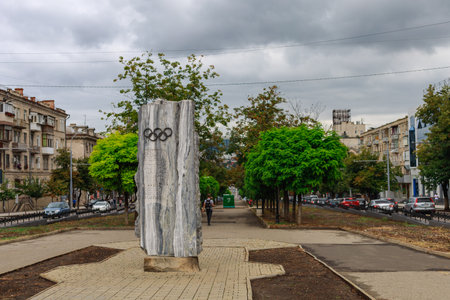 City alley of Olympic athletes, selective focus on the monument to the Olympic Games. August 26, 2021 Chisinau Moldova, for illustrative editorial use. Background with copy space for textのeditorial素材