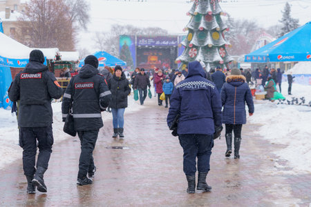 The police patrol the city fair. December 28, 2021 Balti Moldova. Illustrative editorialのeditorial素材