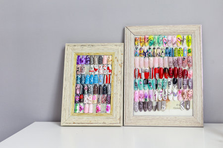 September 17, 2021 Balti Moldova nail samples in a beauty salon, manicure and nail service. For editorial use. Backgroundのeditorial素材
