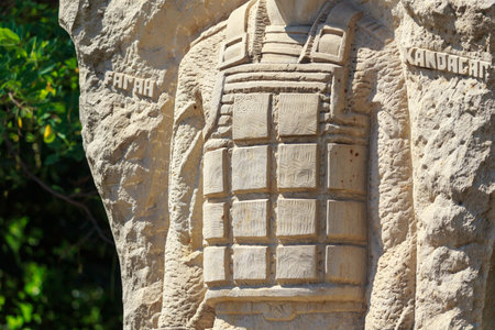 August 11, 2021, Falesti Moldova Element of the monument to a soldier, body armor close-up. For editorial use. Background.のeditorial素材
