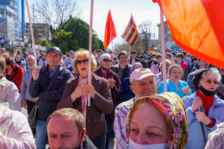 April 15, 2022 Balti Moldova, Protest against the ban on the St. George ribbon. Crowd of people in...