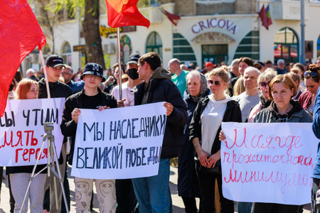 April 15, 2022 Balti Moldova, Protest against the ban on the St. George ribbon. Protesters with placards. Illustrative editorial backgroundのeditorial素材