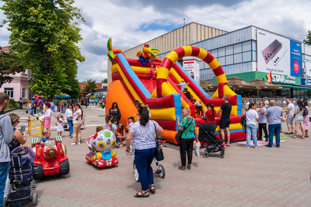 Inflatable slide. Area for entertainment of children at a street festival. June 25, 2022 Balti Moldova. Illustrative editorialのeditorial素材