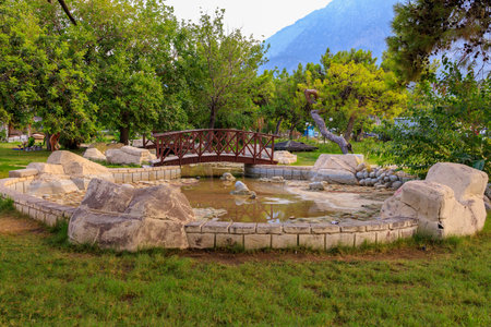 Public city park in the coastal zone. Popular place among tourists, local attraction. Tourist province of Antalya in the Kemer region. August 5, 2022 Beldibi Turkeyのeditorial素材