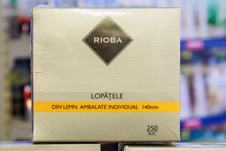 Box with wooden spoons on the store shelf. Illustrative editorial. May 12, 2022 Balti Moldovaのeditorial素材