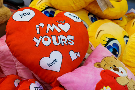Decorative pillow in the shape of a heart on a store shelf. Illustrative editorial. February 10, 2022 Balti Moldovaのeditorial素材