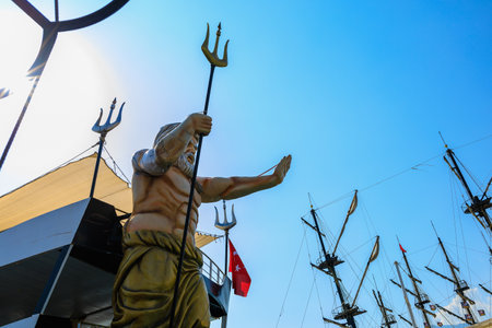 Poseidon as a symbol in the seaport. Background with copy space. August 9, 2022 Kemer, Antalya province, Turkey.のeditorial素材