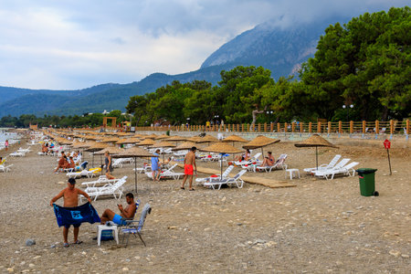 August 11, 2022 Beldibi, Kemer district, Antalya Province, Turkey. City public beach. Background with copy space for textのeditorial素材