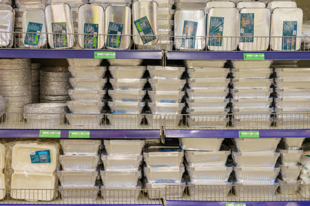 Aluminum plates and utensils for barbecue and baking on the store shelf. April 30, 2022 Beltsy Moldova.のeditorial素材