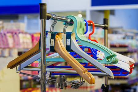 Clothes hangers on the store shelf. April 7, 2022 Beltsy Moldova.のeditorial素材
