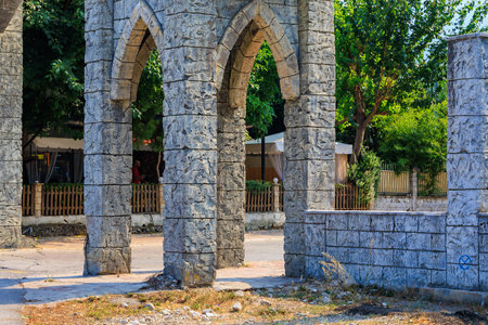 Turkish city gate in classical Islamic architecture style. Background with copy space for text. August 7, 2022 Beldibi Antalya province, Kemer region Turkey.のeditorial素材