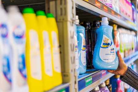The customer takes the fabric softener from the shelf. Department of cleanliness in the supermarket. October 11, 2022 Beltsy Moldova.のeditorial素材
