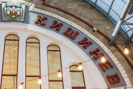 The inscription Chisinau in Russian on the building of the city railway station. Editorial background. November 6, 2022 Chisinau Moldova.のeditorial素材