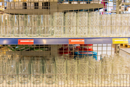 Beer mugs and glasses. Goods in the supermarket. June 15, 2022 Beltsy Moldova.のeditorial素材