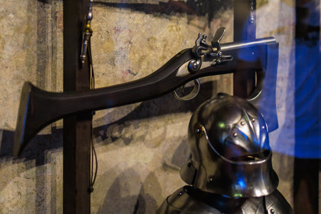August 22, 2022 Prague, Czech Republic. Ax with a built-in gun. Background with selective focus and copy spaceのeditorial素材