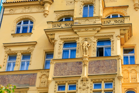 August 27, 2022 Prague, Czech Republic. Ancient sculpture in urban architecture. Background with selective focus and copy spaceのeditorial素材