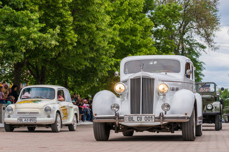 May 22, 2022 Beltsy, Moldova. Illustrative editorial. Retro cars at the city parade.のeditorial素材