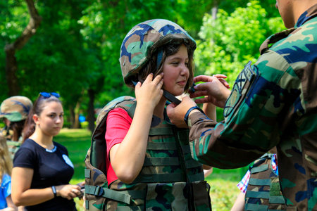 June 1, 2022 Balti Moldova. Illustrative editorial background. Military classes with children at security trainingのeditorial素材