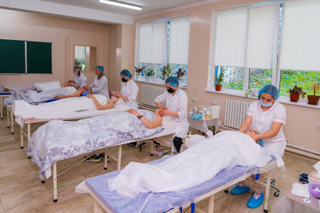 May 17, 2022 Balti Moldova. Beautician performs the procedure. Illustrative editorial. Backgroundのeditorial素材