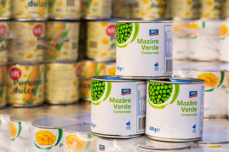 September 19, 2022 Beltsy, Moldova. For illustrative editorial use. Green canned peas.のeditorial素材