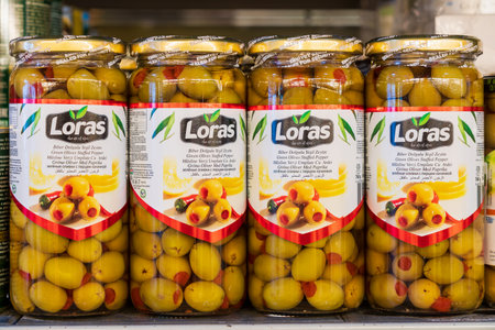 September 19, 2022 Beltsy, Moldova. For illustrative editorial use. Green canned olives.のeditorial素材