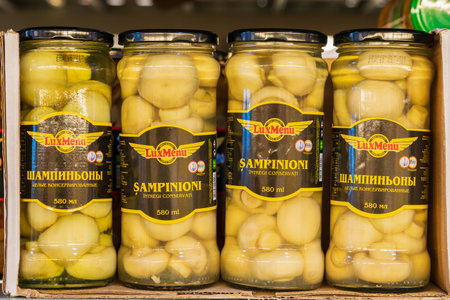 September 19, 2022 Beltsy, Moldova. For illustrative editorial use. Whole canned mushrooms.のeditorial素材